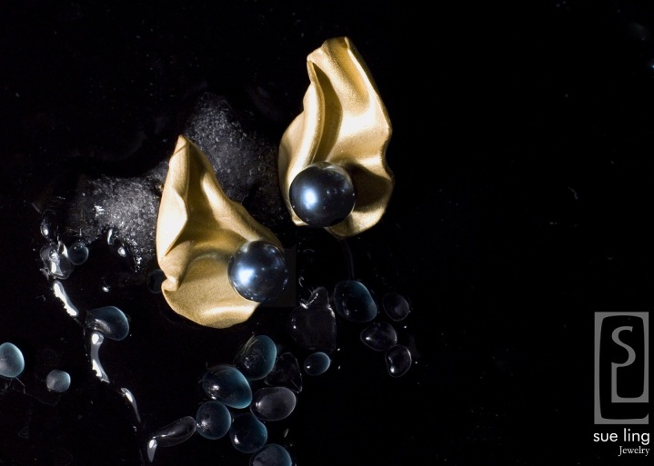 teardrop folds studs - south sea pearls.jpg